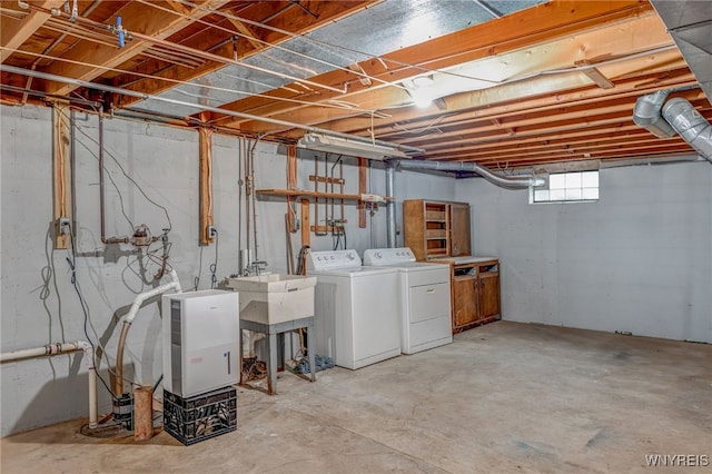 7415 Colonial Dr, Niagara, NY 14305 - basement with separate washer and dryer and a sink