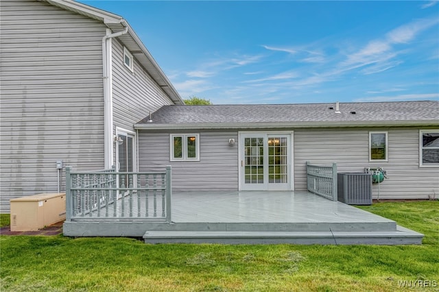 7415 Colonial Dr, Niagara, NY 14305 - back of house featuring a yard, a deck, and central air condition unit