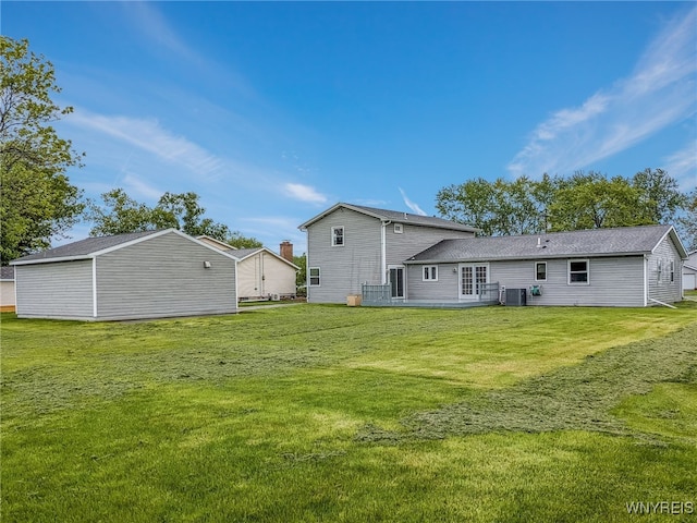 7415 Colonial Dr, Niagara, NY 14305 - rear view of property with a yard and central AC