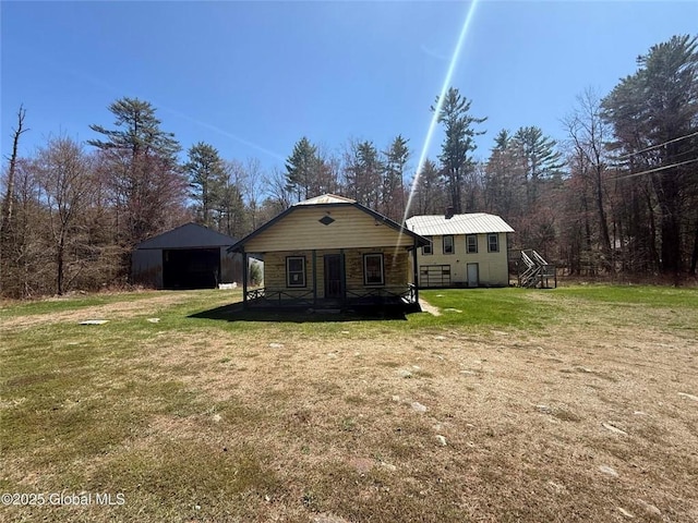 8000 State Route 8, Horicon, NY 12815 - back of house with a yard and an outdoor structure