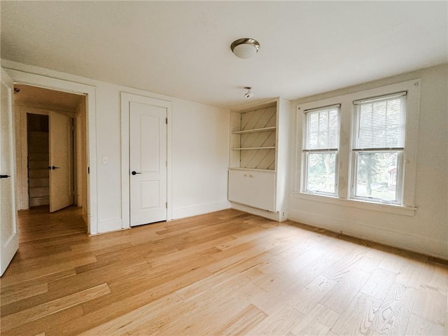 31 Overbrook Rd, Pittsford, NY 14618 - empty room featuring light wood finished floors and baseboards
