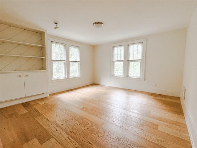 31 Overbrook Rd, Pittsford, NY 14618 - empty room with light wood-style flooring and baseboards