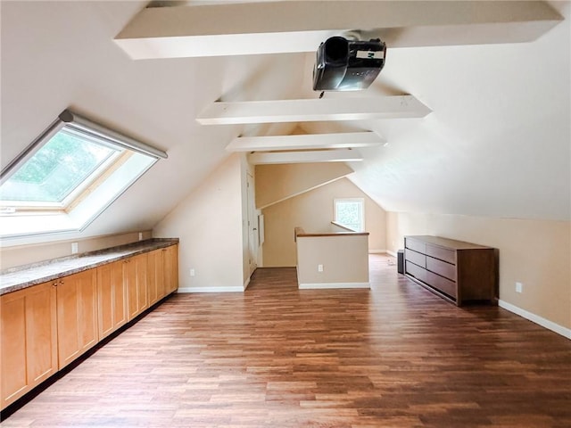 31 Overbrook Rd, Pittsford, NY 14618 - additional living space featuring a skylight, wood finished floors, lofted ceiling, and baseboards