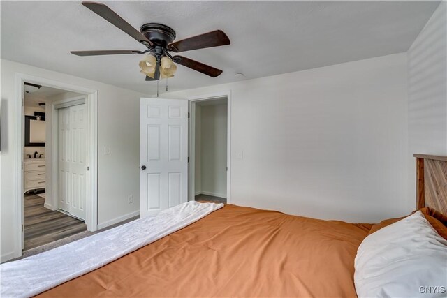 1010 Academy St, Watertown-City, NY 13601 - bedroom with a ceiling fan, ensuite bath, and a closet