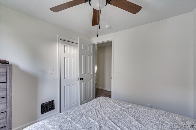 1010 Academy St, Watertown-City, NY 13601 - bedroom featuring a closet, a ceiling fan, and baseboards