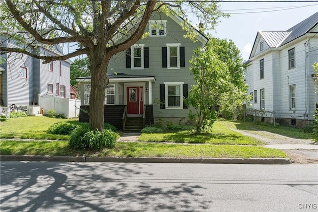 1010 Academy St, Watertown-City, NY 13601 - view of front of property with entry steps and central AC unit