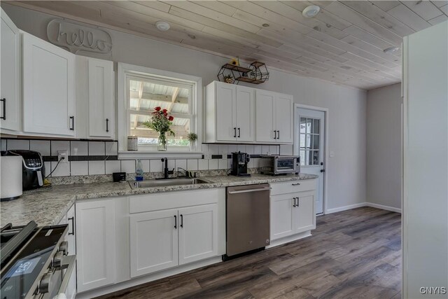 1010 Academy St, Watertown-City, NY 13601 - kitchen featuring dishwasher, a sink, wood ceiling, healthy amount of natural light, and range