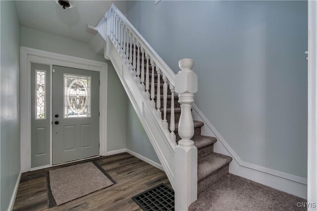 1010 Academy St, Watertown-City, NY 13601 - foyer entrance with stairway, wood finished floors, and baseboards