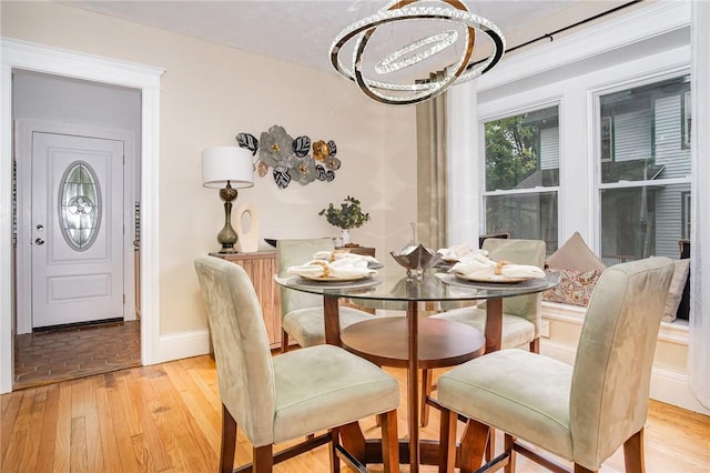 162 Post Ave, Rochester, NY 14619 - dining space with light wood-style floors and baseboards
