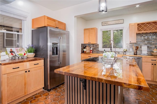 162 Post Ave, Rochester, NY 14619 - kitchen featuring butcher block countertops, stainless steel appliances, light brown cabinets, and recessed lighting