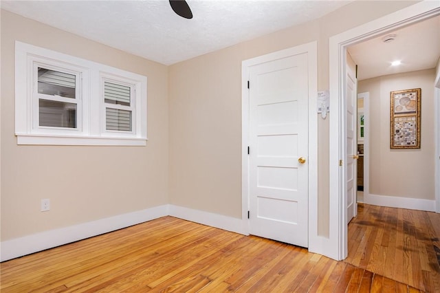 162 Post Ave, Rochester, NY 14619 - unfurnished bedroom with light wood finished floors and baseboards