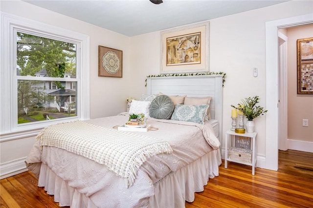 162 Post Ave, Rochester, NY 14619 - bedroom with wood finished floors and baseboards