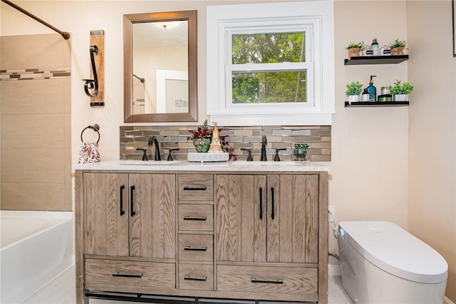 162 Post Ave, Rochester, NY 14619 - full bathroom with decorative backsplash, double vanity, toilet, and shower / tub combination