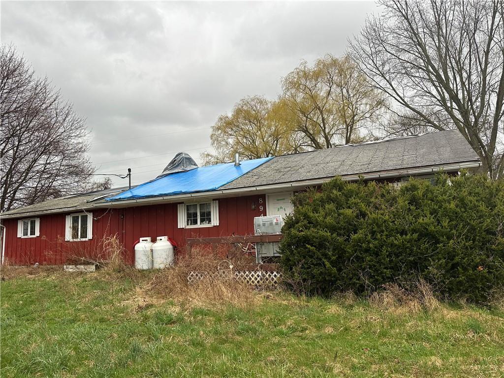 894 Middle Rd, Veteran, NY 14845 - view of property exterior with board and batten siding