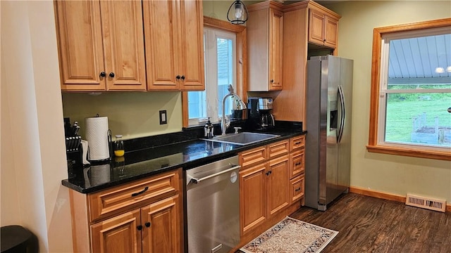 5267 Wheeler Rd, Elbridge, NY 13166 - kitchen with stainless steel appliances, a sink, plenty of natural light, and dark wood finished floors