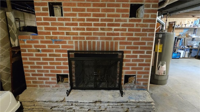5267 Wheeler Rd, Elbridge, NY 13166 - basement view of water heater, a brick fireplace, and unfinished concrete floors