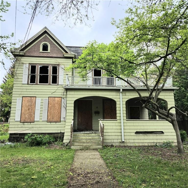 356 W 1st St, Elmira-City, NY 14901 - view of front facade featuring a balcony and covered porch