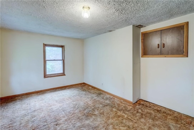 16 Welch Ave, Hamlin, NY 14470 - carpeted spare room featuring a textured ceiling and baseboards