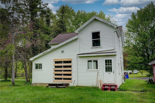16 Welch Ave, Hamlin, NY 14470 - back of house with a yard