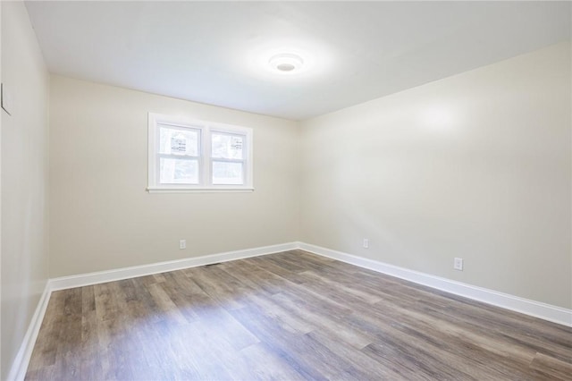 162 Berkshire Dr, Greece, NY 14626 - unfurnished room featuring dark wood-style floors and baseboards