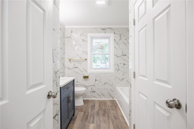 162 Berkshire Dr, Greece, NY 14626 - full bath with vanity, toilet, a tub to relax in, wood finished floors, and crown molding