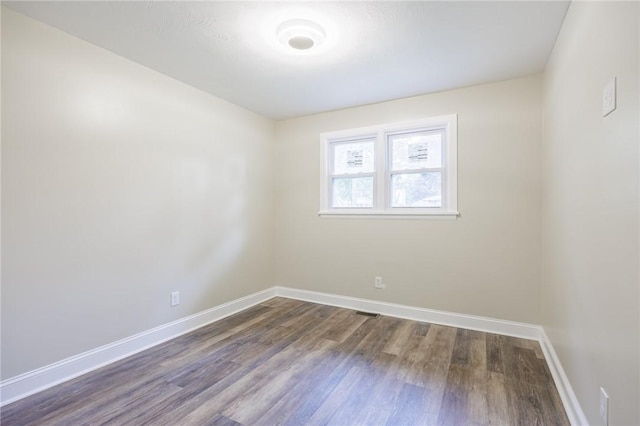 162 Berkshire Dr, Greece, NY 14626 - empty room featuring dark wood-style floors and baseboards