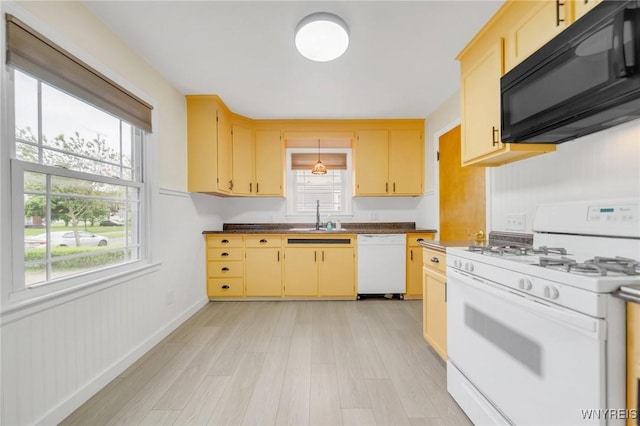 470 Windermere Blvd, Amherst, NY 14226 - kitchen featuring white appliances, a sink, light wood finished floors, and dark countertops