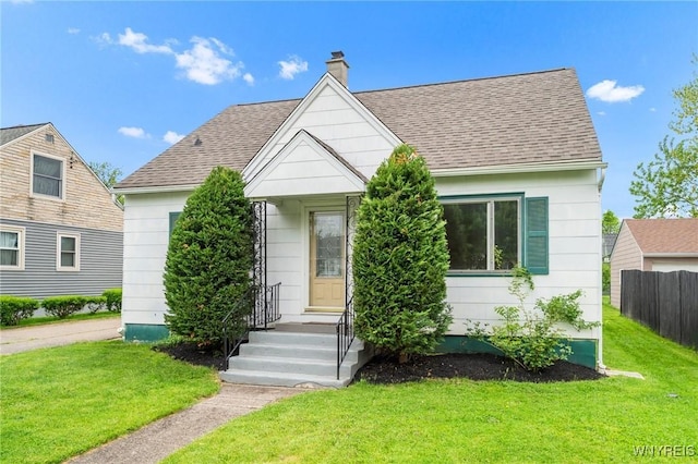 470 Windermere Blvd, Amherst, NY 14226 - view of front facade featuring roof with shingles and a chimney