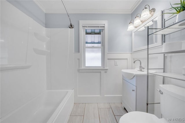 470 Windermere Blvd, Amherst, NY 14226 - bathroom with ornamental molding, vanity, toilet, shower / tub combination, and wainscoting