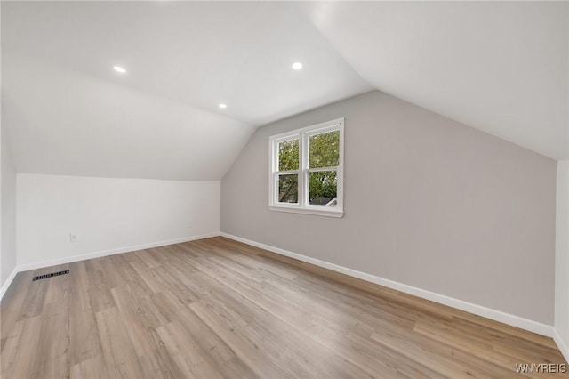470 Windermere Blvd, Amherst, NY 14226 - additional living space with baseboards, lofted ceiling, light wood-style flooring, and recessed lighting