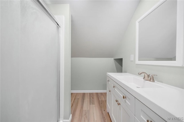 470 Windermere Blvd, Amherst, NY 14226 - full bathroom featuring wood finished floors, vanity, lofted ceiling, and a shower stall