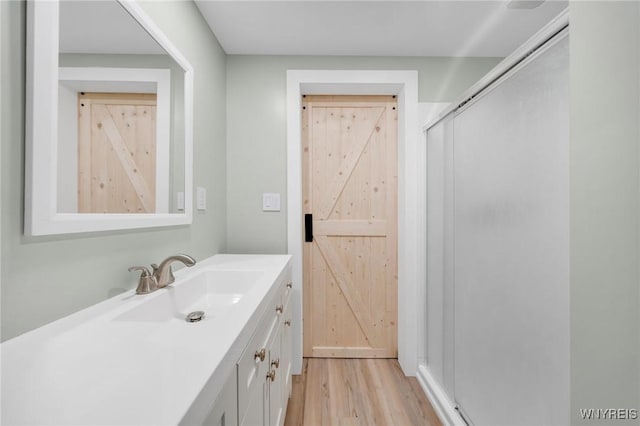 470 Windermere Blvd, Amherst, NY 14226 - full bathroom featuring vanity, wood finished floors, and an enclosed shower