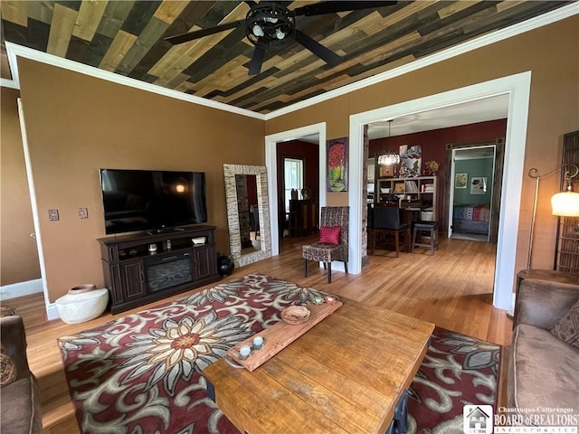 28 N Washington St, Randolph, NY 14772 - living room featuring ornamental molding, ceiling fan, wood finished floors, and baseboards