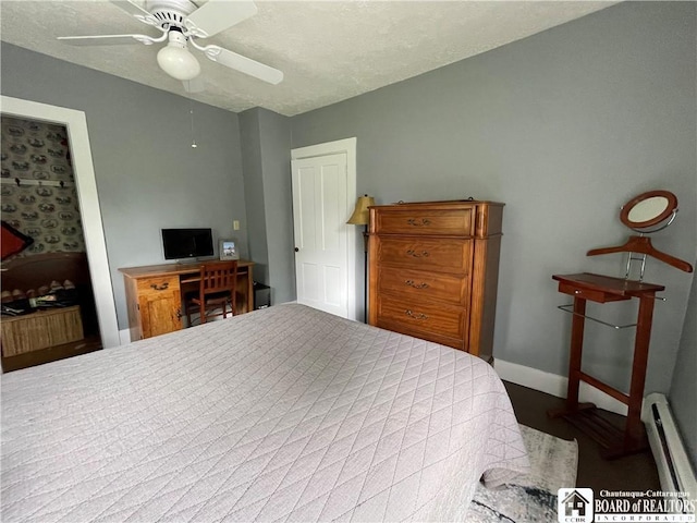 28 N Washington St, Randolph, NY 14772 - bedroom with a baseboard heating unit, baseboards, and ceiling fan