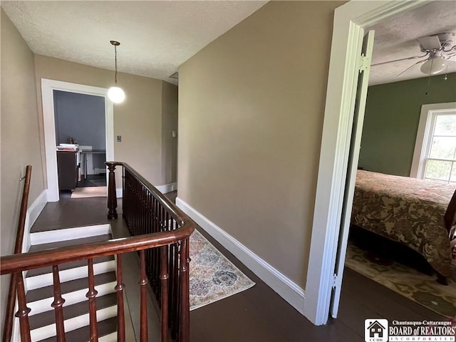28 N Washington St, Randolph, NY 14772 - staircase featuring baseboards, ceiling fan, and a textured ceiling