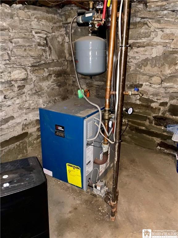 28 N Washington St, Randolph, NY 14772 - utility room featuring a heating unit