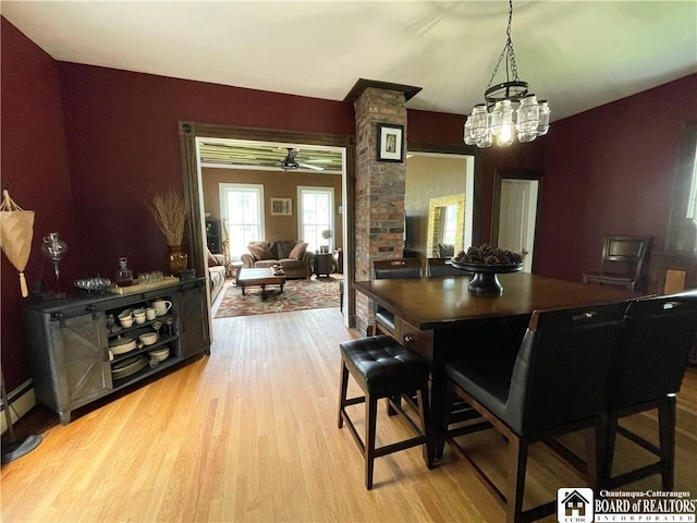 28 N Washington St, Randolph, NY 14772 - dining area with wood finished floors, a chandelier, and ceiling fan