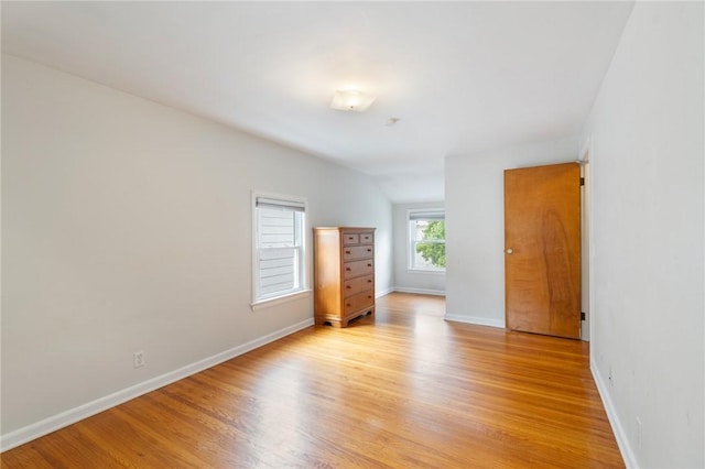 156 Rossiter Rd, Rochester, NY 14620 - unfurnished bedroom featuring light wood-style flooring and baseboards
