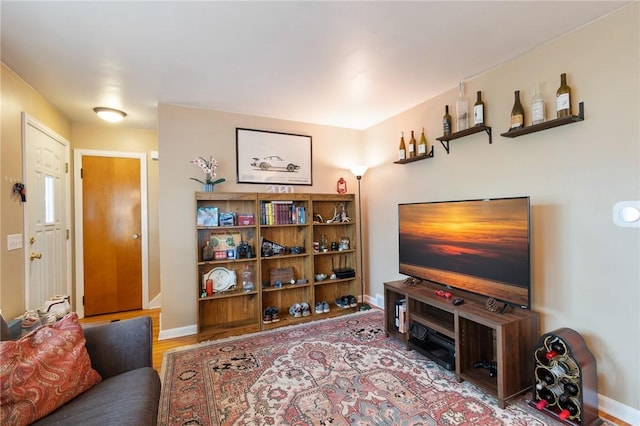 156 Rossiter Rd, Rochester, NY 14620 - living room with baseboards and wood finished floors