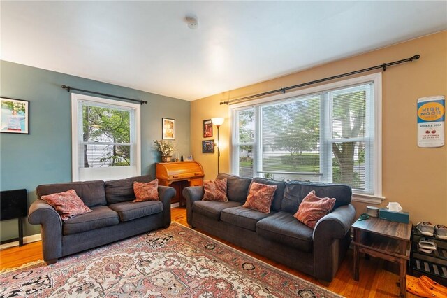 156 Rossiter Rd, Rochester, NY 14620 - living room with wood finished floors and healthy amount of natural light