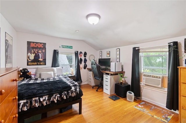 156 Rossiter Rd, Rochester, NY 14620 - bedroom featuring lofted ceiling, light wood-style floors, multiple windows, cooling unit, and an office area