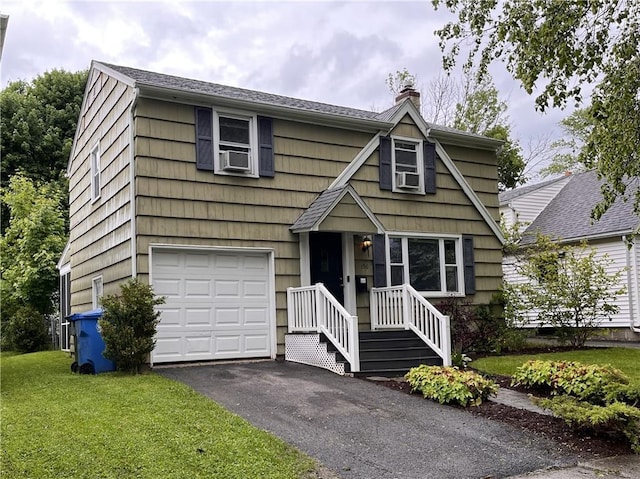 156 Rossiter Rd, Rochester, NY 14620 - view of front of home with a chimney, an attached garage, a front yard, asphalt driveway, and roof with shingles