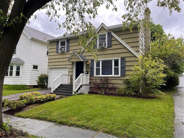 156 Rossiter Rd, Rochester, NY 14620 - view of front of house with an attached garage, driveway, a front yard, cooling unit, and a chimney