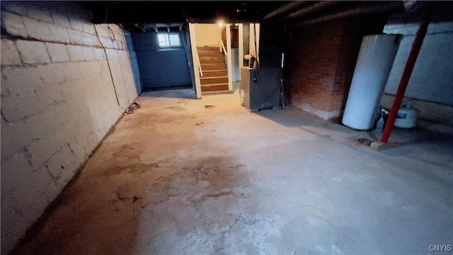 267 Fenway Dr, Syracuse, NY 13224 - basement featuring stairway and water heater