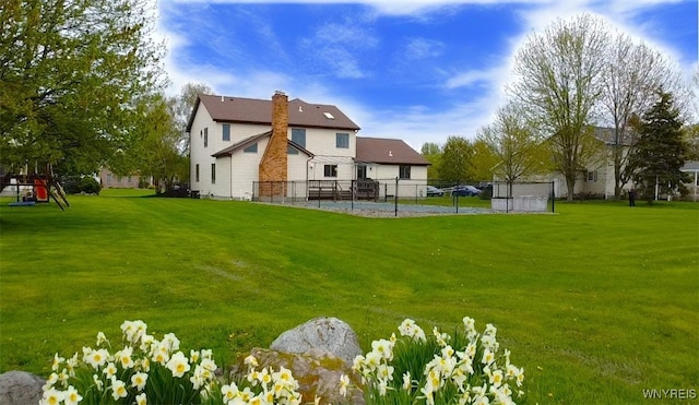 40 River Oaks Dr, Grand Island, NY 14072 - rear view of property with a chimney