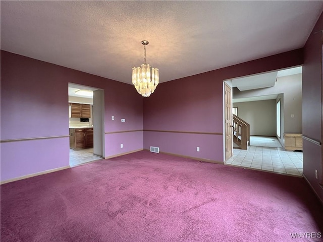 40 River Oaks Dr, Grand Island, NY 14072 - empty room with a chandelier, carpet, and baseboards