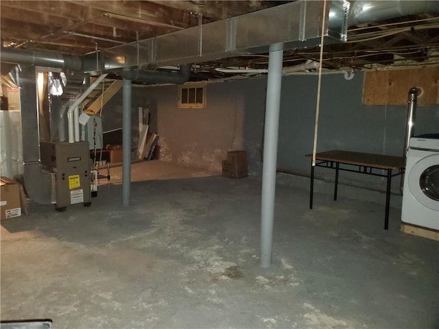 575 Lyon St, Elmira-City, NY 14904 - unfinished basement with washer / clothes dryer and heating unit
