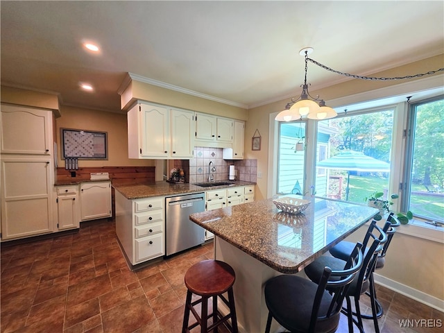 3666 S Hill Rd, Hamburg, NY 14075 - kitchen featuring stainless steel dishwasher, a sink, ornamental molding, white cabinetry, and a kitchen bar