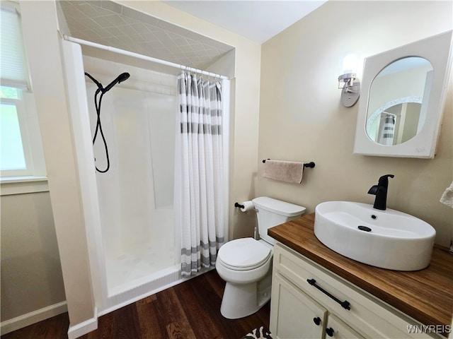 3666 S Hill Rd, Hamburg, NY 14075 - full bathroom with wood finished floors, toilet, a shower with shower curtain, and vanity