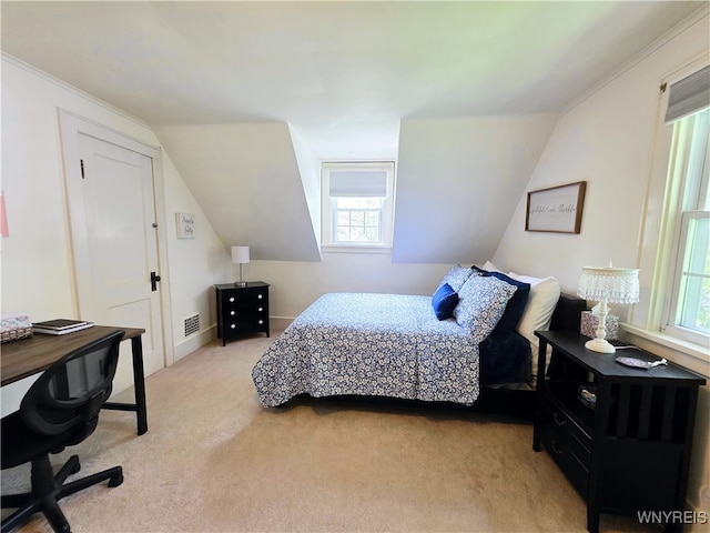 3666 S Hill Rd, Hamburg, NY 14075 - bedroom with multiple windows, light colored carpet, vaulted ceiling, and a desk